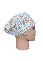 Doodles print scrub cap side view on mannequin