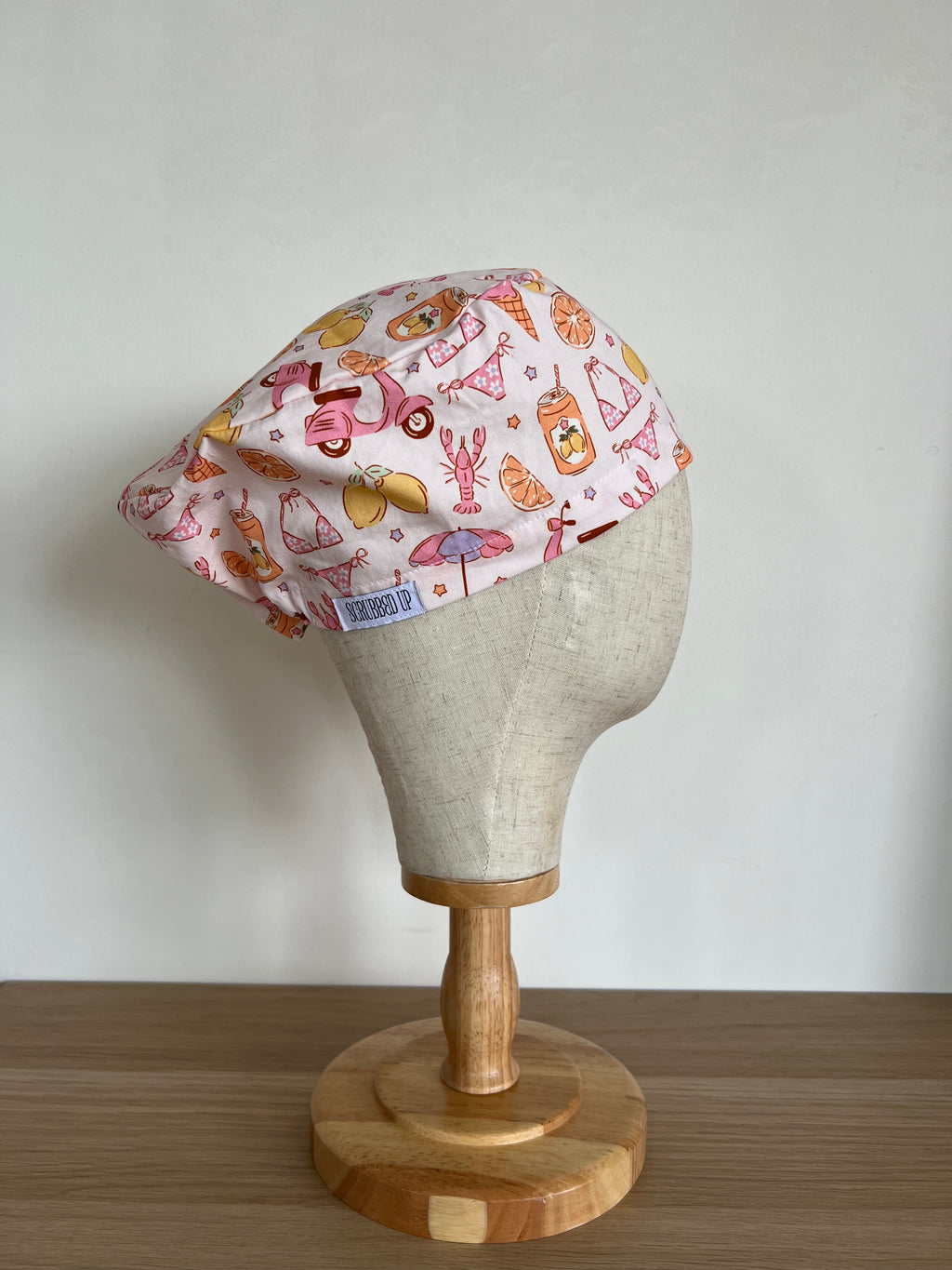 Euro Summer print scrub cap side view on mannequin