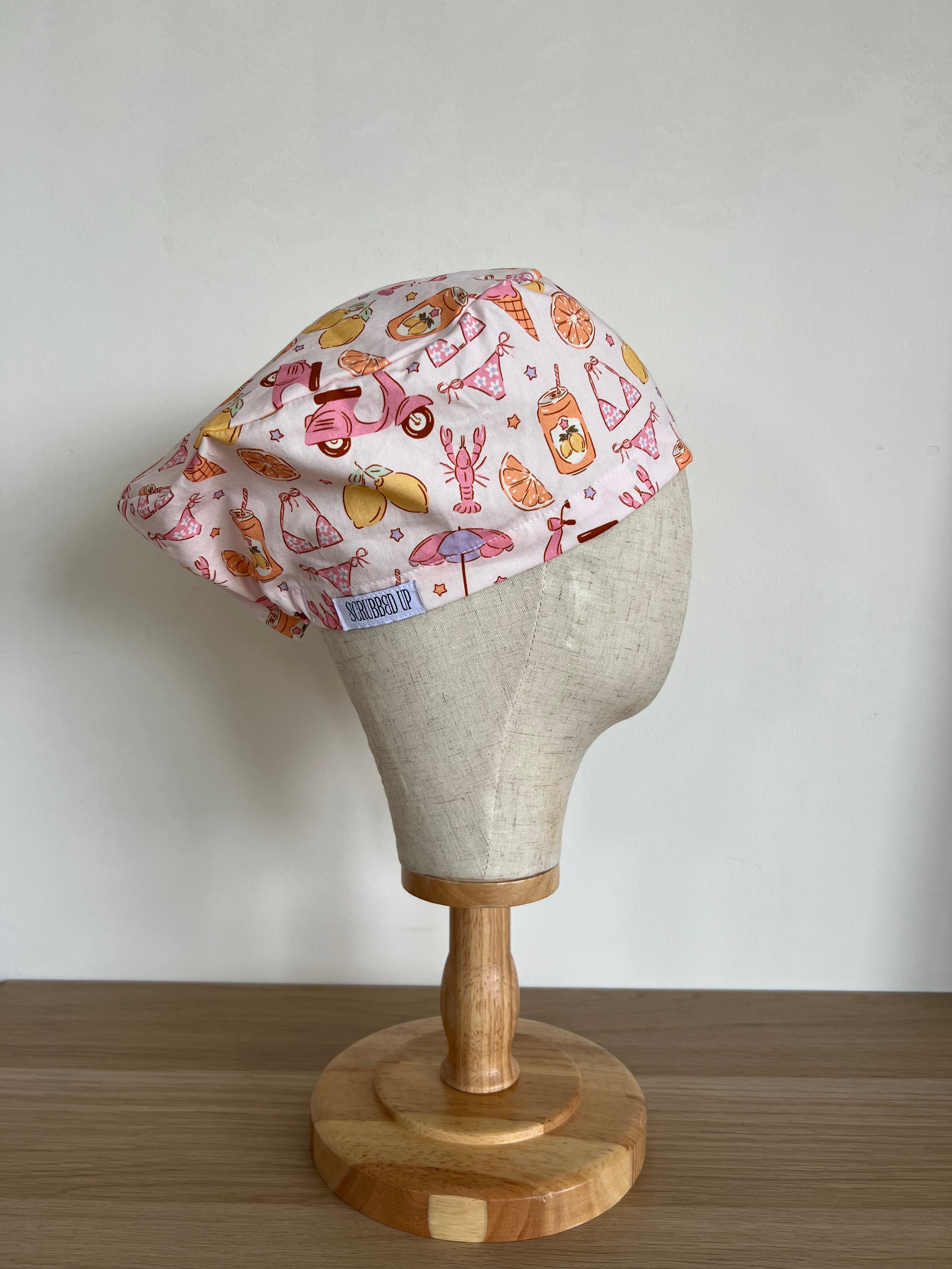 Euro Summer print scrub cap side view on mannequin