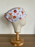 Breakfast print scrub cap side view on mannequin