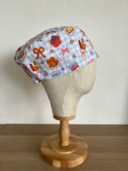 Breakfast print scrub cap side view on mannequin