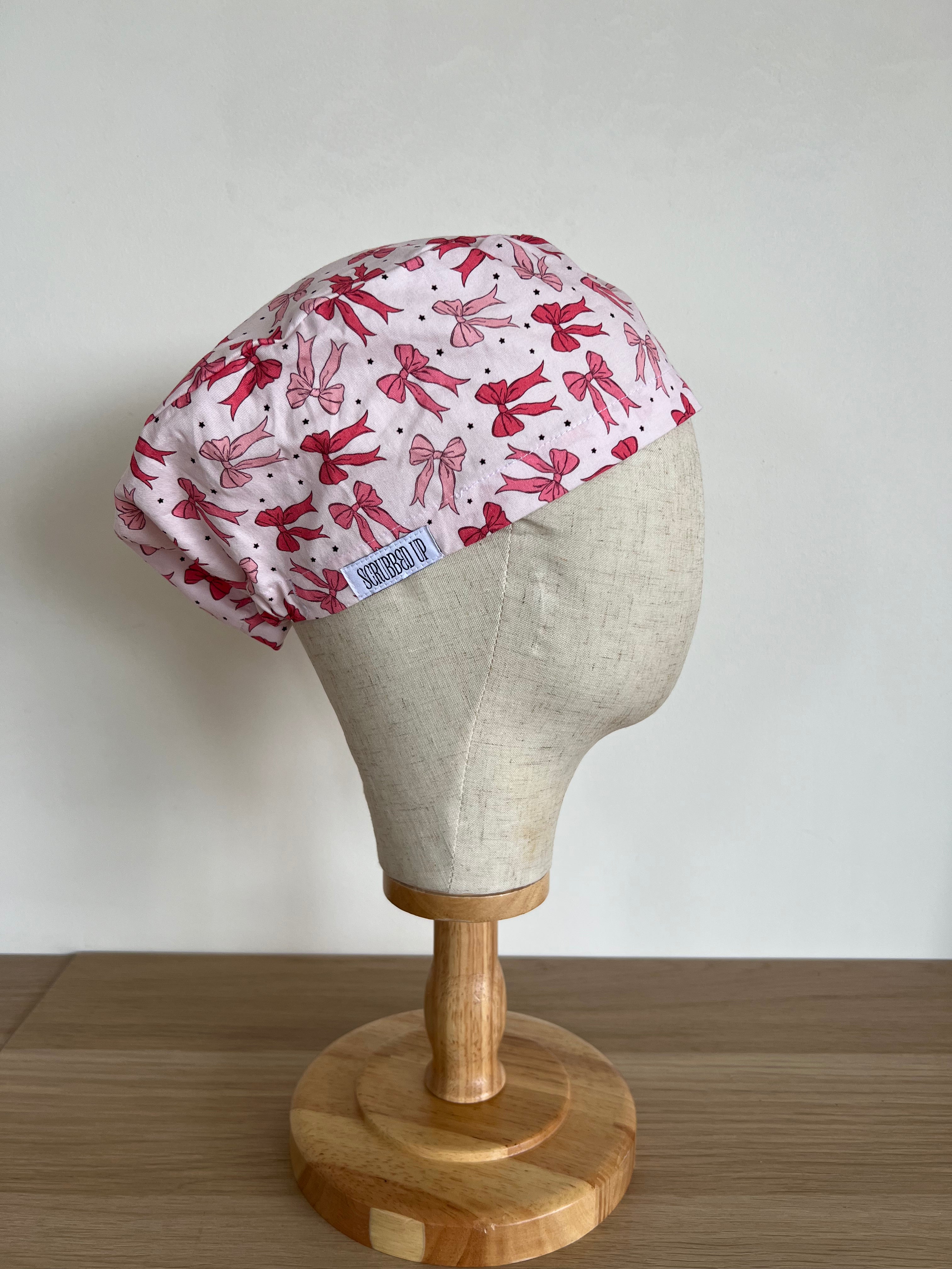 Bow print scrub cap side view on mannequin