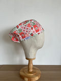 Strawberry Patch print scrub cap side view on mannequin